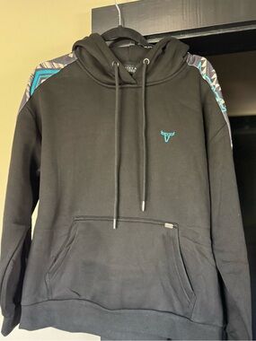 Lucky & Blessed Black Hoodie with Turquoise Logo and Patterned Shoulder Panels